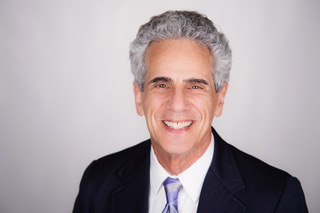 Gil E. Gordon Gil E. Gordon